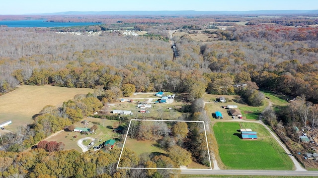 aerial view featuring a view of trees