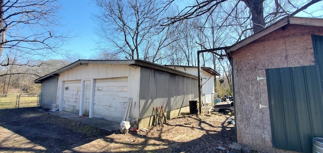 detached garage with fence