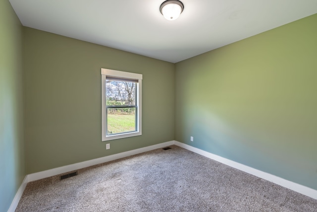 unfurnished room with carpet