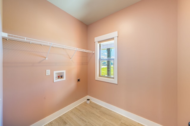 laundry area with hookup for an electric dryer and hookup for a washing machine