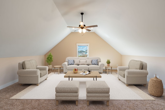 living room featuring carpet, vaulted ceiling, and ceiling fan