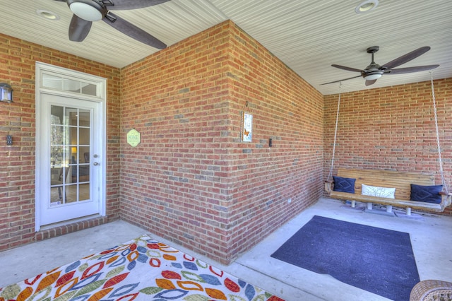 view of patio featuring ceiling fan