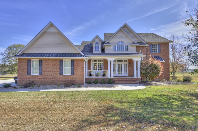 view of front facade featuring a front lawn and covered porch