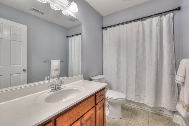 full bathroom featuring tile patterned floors, vanity, shower / bath combo, and toilet