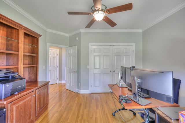 home office featuring light hardwood / wood-style flooring, ceiling fan, and ornamental molding