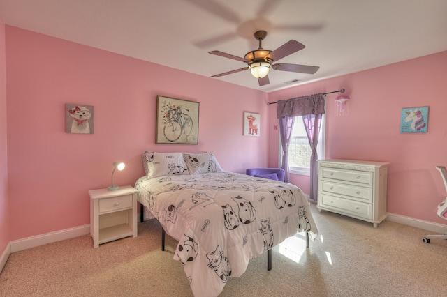 bedroom featuring ceiling fan and light colored carpet