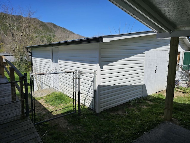 view of home's exterior with a mountain view