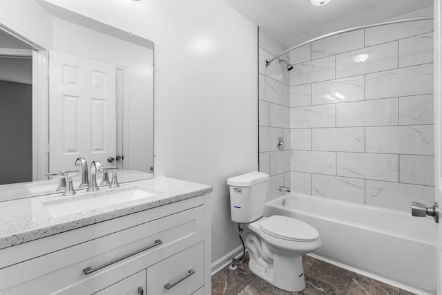 full bathroom featuring a textured ceiling, vanity, toilet, and tiled shower / bath