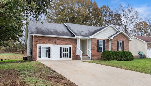 single story home featuring central AC and a front yard