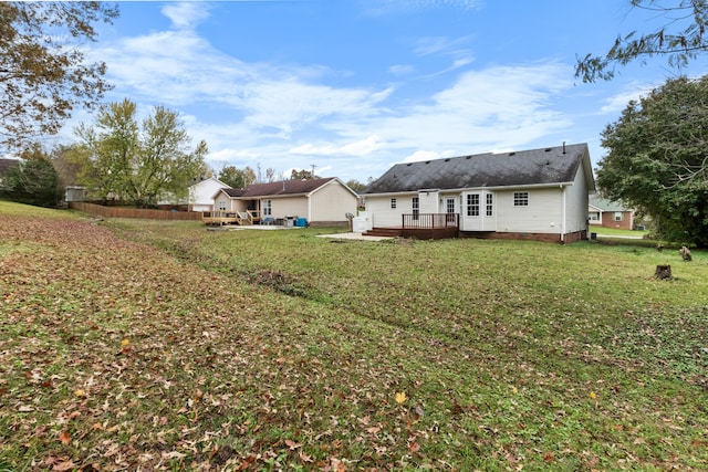 view of yard featuring a wooden deck