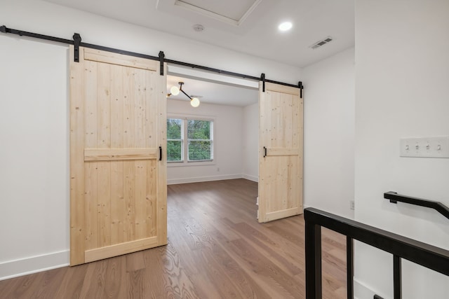 interior space with hardwood / wood-style flooring