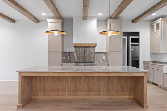 kitchen with decorative backsplash, beamed ceiling, decorative light fixtures, light hardwood / wood-style floors, and stainless steel appliances