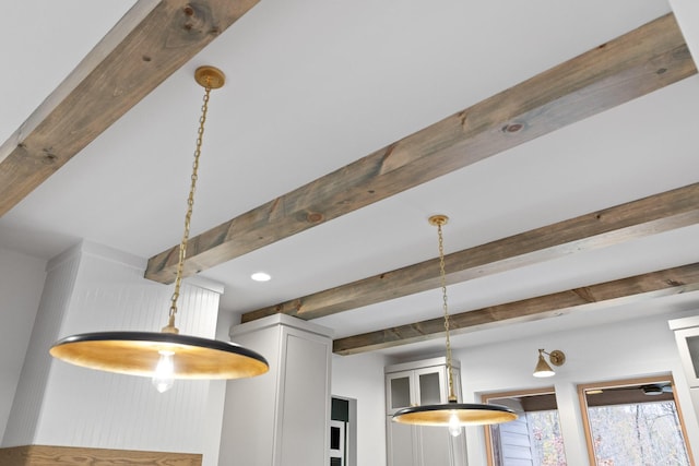 kitchen view of beam ceiling and hanging light fixtures