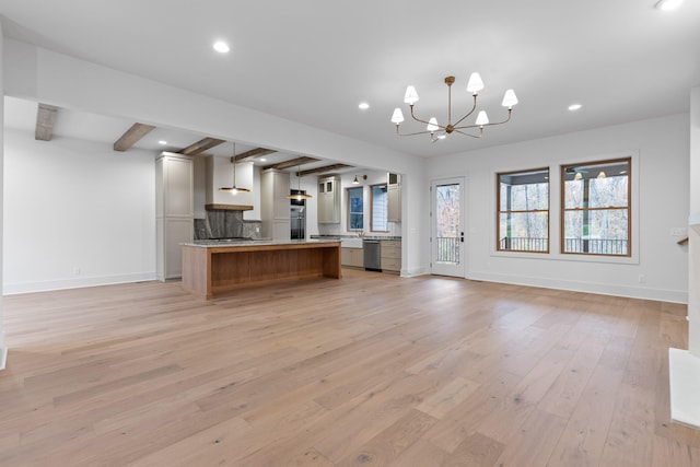 kitchen with beam ceiling, dishwasher, a center island, light hardwood / wood-style flooring, and decorative light fixtures