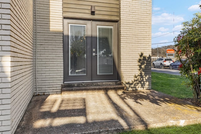 property entrance featuring french doors