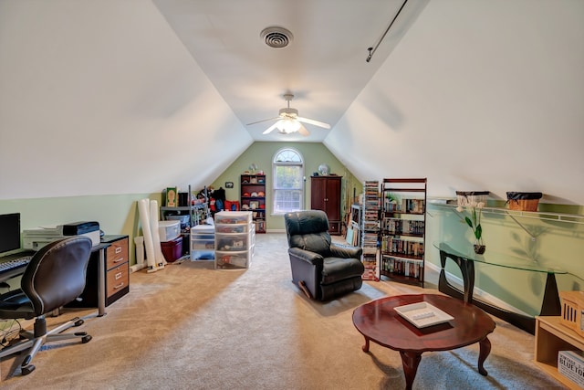 carpeted home office with ceiling fan and lofted ceiling