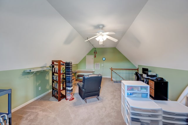 office space featuring light carpet, vaulted ceiling, and ceiling fan