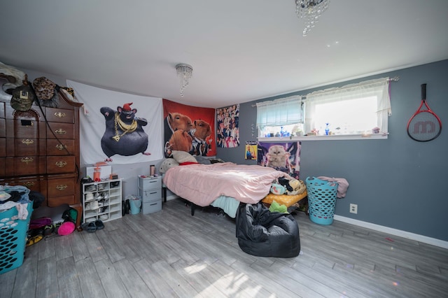 bedroom with wood-type flooring