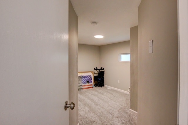 hall featuring carpet floors