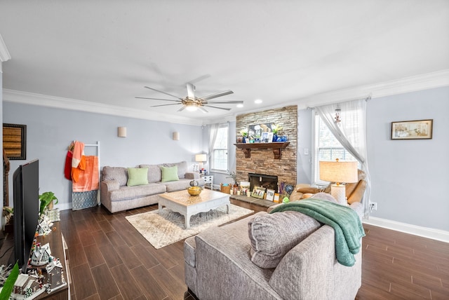 living room with ornamental molding, dark hardwood / wood-style floors, and a healthy amount of sunlight