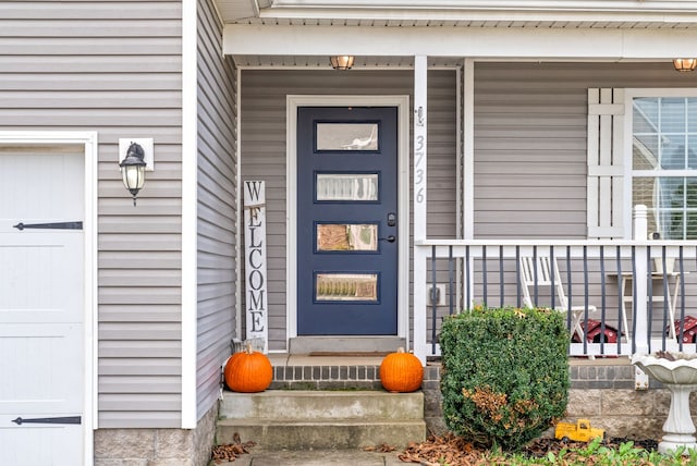 property entrance with a porch