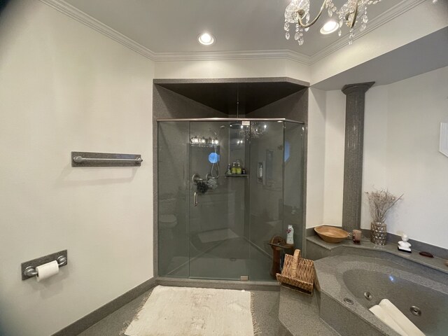 bathroom featuring separate shower and tub, crown molding, and decorative columns