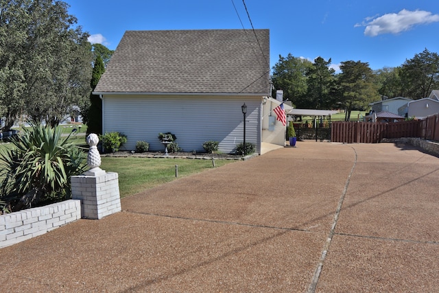 view of home's exterior with a yard