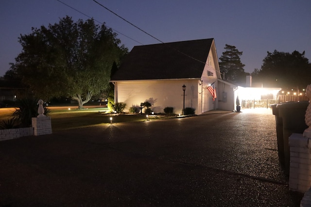 view of property exterior at dusk