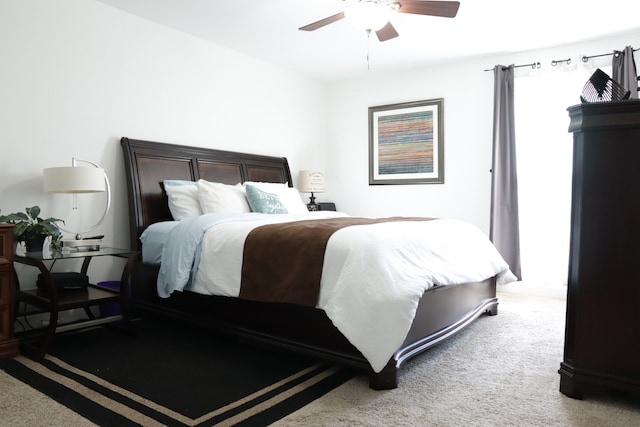 bedroom featuring ceiling fan and carpet floors