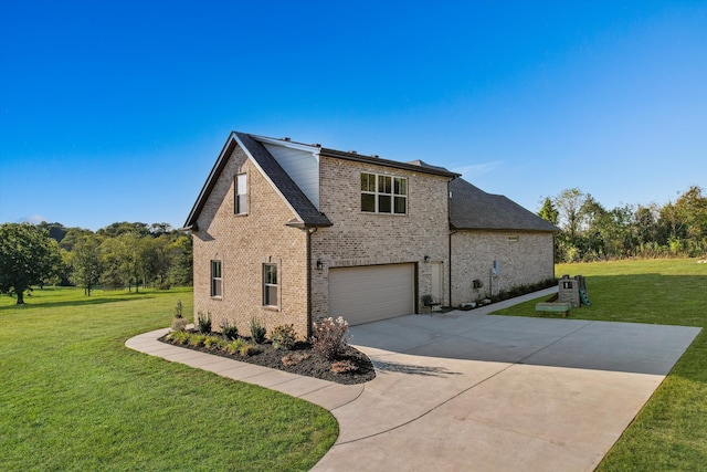 view of side of property featuring a garage and a lawn