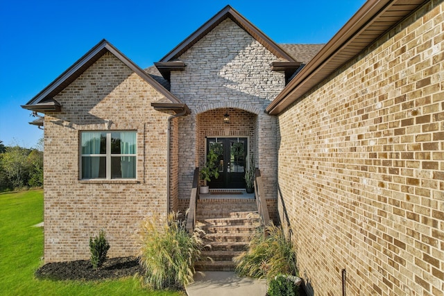 doorway to property featuring french doors