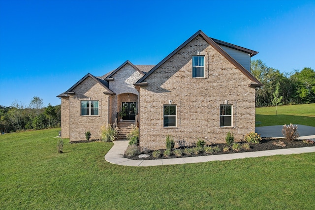 view of front of property with a front lawn