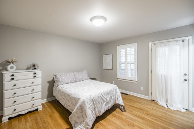 bedroom featuring light hardwood / wood-style floors