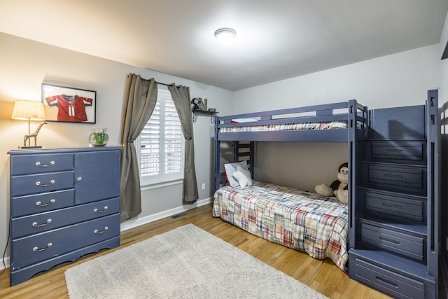 bedroom featuring hardwood / wood-style flooring