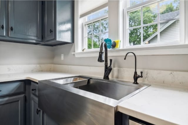 kitchen with a healthy amount of sunlight and sink