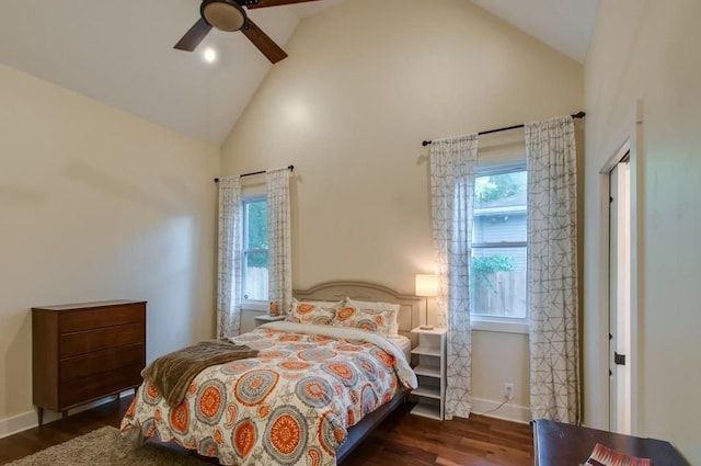 bedroom featuring ceiling fan, high vaulted ceiling, and dark hardwood / wood-style floors