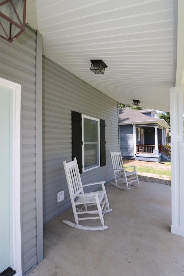 view of patio featuring a porch