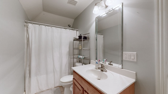 bathroom with tile patterned flooring, vanity, toilet, and a shower with curtain