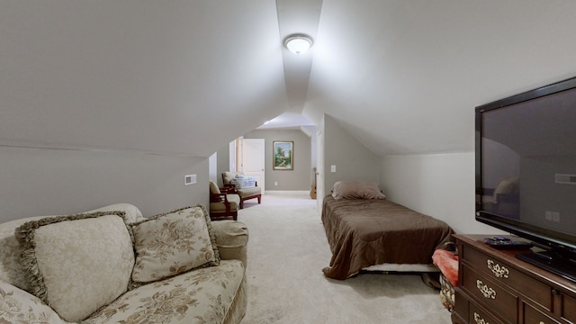 carpeted bedroom featuring vaulted ceiling