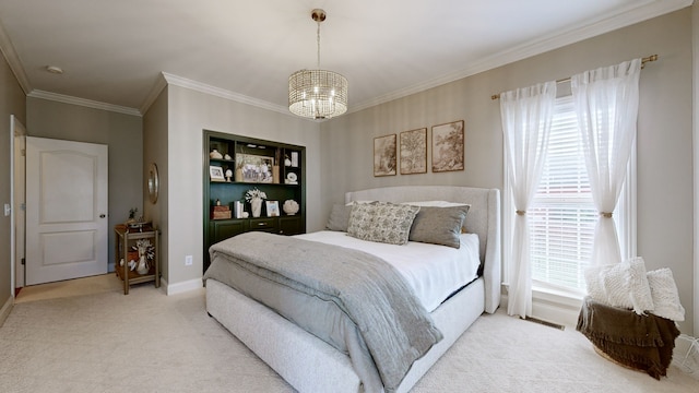 carpeted bedroom featuring a chandelier and crown molding