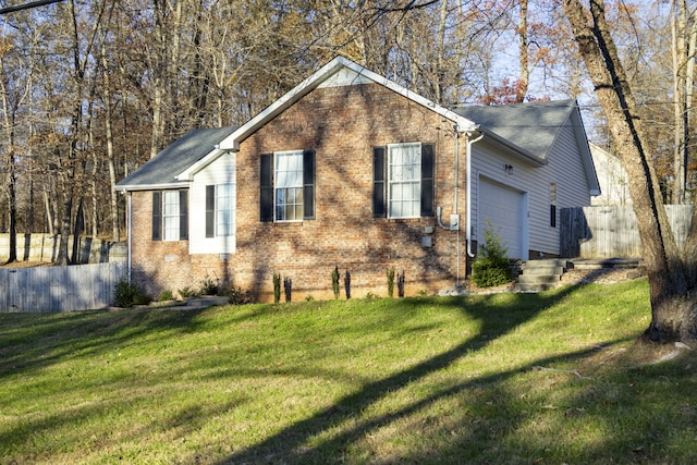 view of front facade with a front lawn and a garage