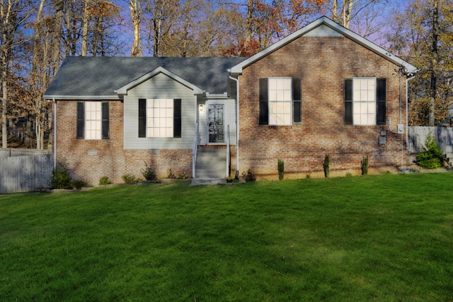 ranch-style house featuring a front lawn