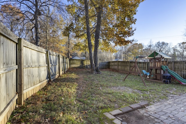 view of yard with a playground