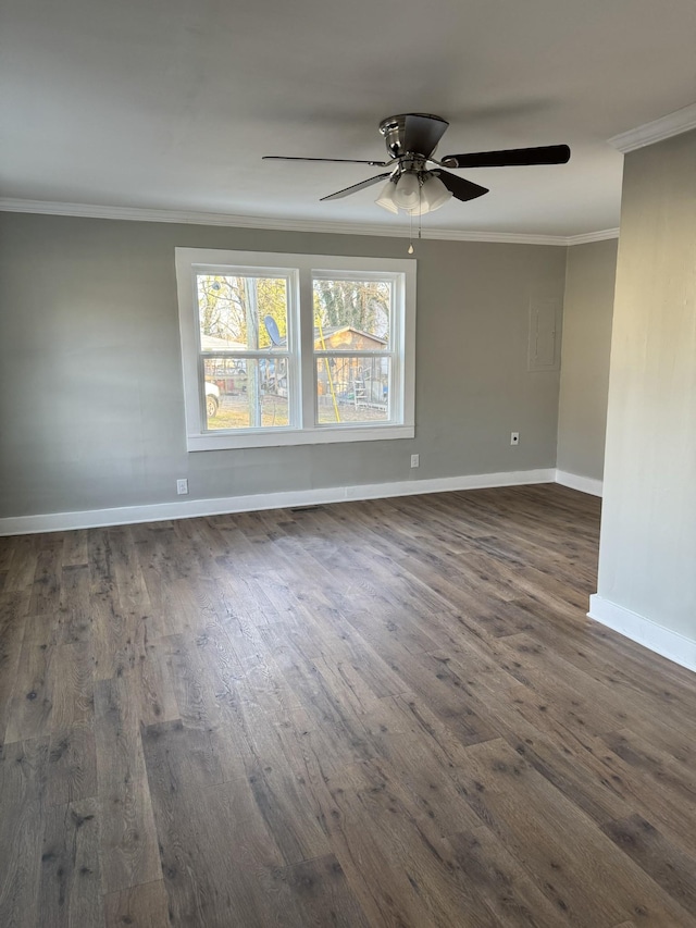 unfurnished room with dark wood-type flooring, crown molding, baseboards, and ceiling fan