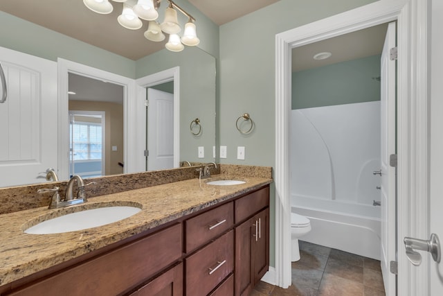 full bathroom featuring tile patterned flooring, vanity, toilet, and shower / tub combination