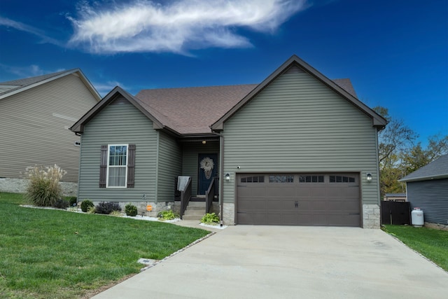 view of front of property with a garage and a front yard