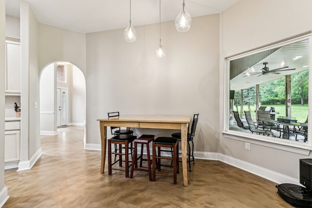 dining room featuring ceiling fan