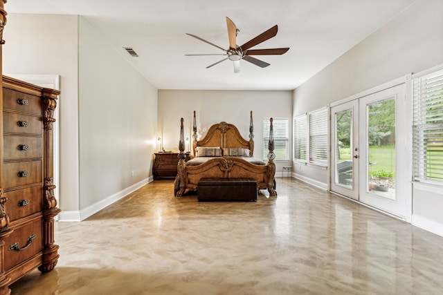 bedroom featuring ceiling fan, access to exterior, french doors, and multiple windows