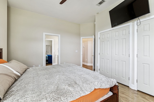 bedroom featuring ceiling fan and a closet