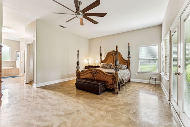 bedroom featuring ensuite bath and ceiling fan